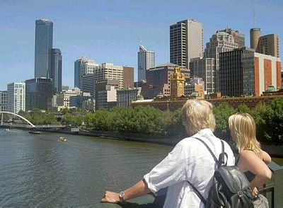 Lidy and Paula look down the Yarra from Prince's Bridge