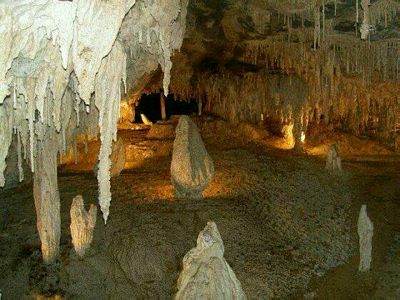 Five variously sized formations, remarkably human in shape, stand spaced evenly around a raised floor. It's tempting to compare them with the work of some renaissance master.